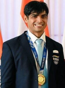 Neeraj Chopra posing with medal