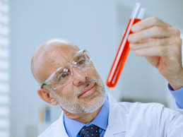 A SCIENTIST WITH A TEST TUBE